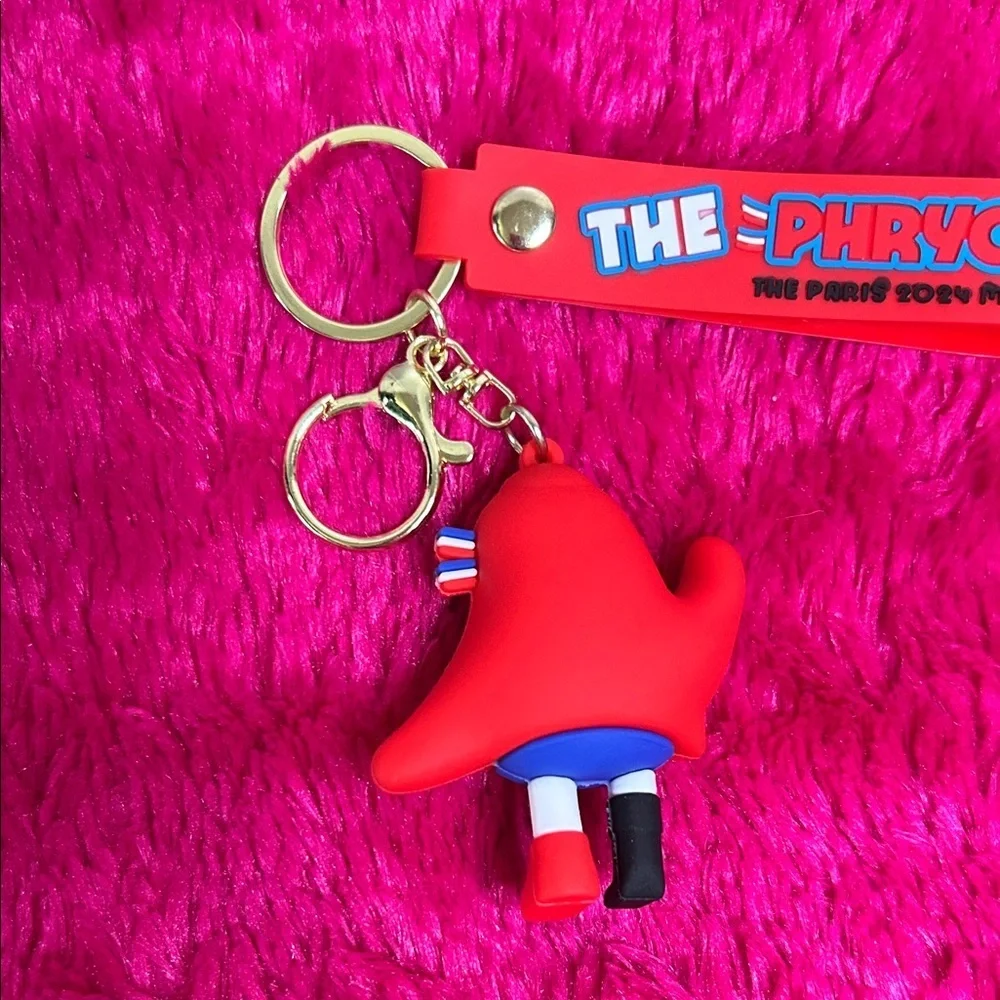 Red Keychain Toy with Blue and Black Accents